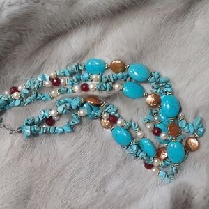 17 inch triple strand turquoise and pearl necklace with sterling clasp.